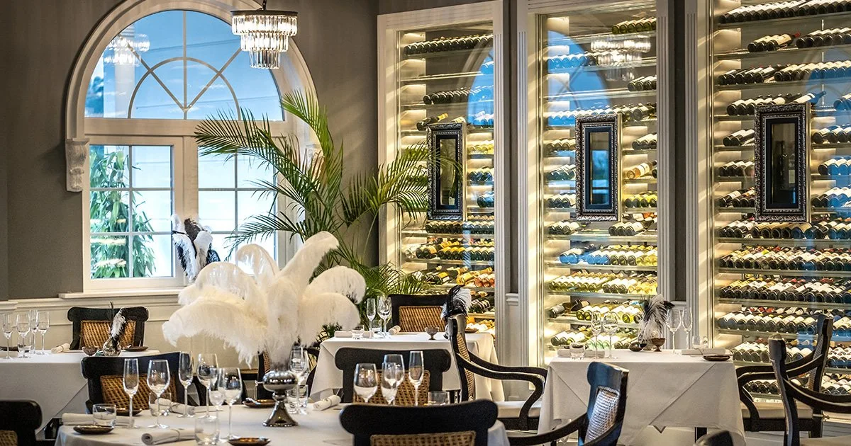 Elegant dining room and wine display at Aperitif