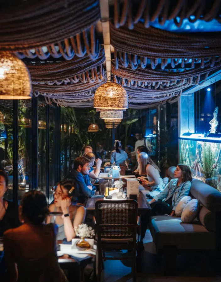 Warmly lit dining room at Nautilus in Ubud