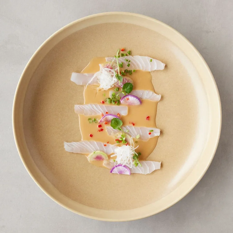 Plated seafood dish at Pica South American Kitchen
